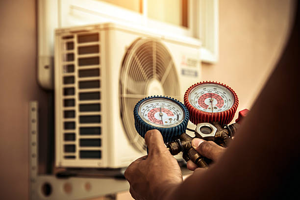 Professional Hvac Maintenance technician working in Cordova, AL